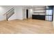 Spacious finished basement with wood-look floors and a wet bar at 2133 N Talbott St, Indianapolis, IN 46202