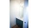 Modern powder room with green vanity and quartz countertop at 2133 N Talbott St, Indianapolis, IN 46202