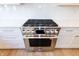 Stainless steel gas range with a sleek design and modern controls at 2133 N Talbott St, Indianapolis, IN 46202