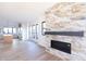 Open living area with a marble fireplace and kitchen views at 2133 N Talbott St, Indianapolis, IN 46202