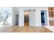 Walk-in pantry with sliding barn door and shelving at 2133 N Talbott St, Indianapolis, IN 46202
