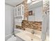 Updated bathroom with tile backsplash and vanity at 3965 N Meridian St # Apt 2G, Indianapolis, IN 46208