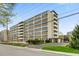Modern apartment building with ample parking and landscaping at 3965 N Meridian St # Apt 2G, Indianapolis, IN 46208