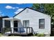 White house with black trim and small porch at 3106 Newton Ave, Indianapolis, IN 46201