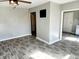 Hallway with gray walls and wood-look floors at 3106 Newton Ave, Indianapolis, IN 46201