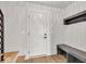 Modern entryway with built-in bench and coat rack at 671 E 16Th St, Indianapolis, IN 46202