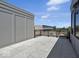 Large rooftop deck with city views and modern railings at 671 E 16Th St, Indianapolis, IN 46202