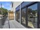 Spacious deck with black railings and sliding glass doors at 671 E 16Th St, Indianapolis, IN 46202