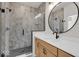 Modern bathroom with marble shower and sleek vanity at 671 E 16Th St, Indianapolis, IN 46202