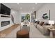 Spacious living room, featuring a fireplace and modern decor at 673 E 16Th St, Indianapolis, IN 46202