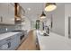 Modern kitchen boasting stainless steel appliances and gray cabinets at 673 E 16Th St, Indianapolis, IN 46202