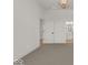 Spacious bedroom with neutral carpeting and an ensuite bathroom at 675 E 16Th St, Indianapolis, IN 46202