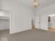 Bright bedroom featuring a walk-in closet and ensuite bath at 675 E 16Th St, Indianapolis, IN 46202
