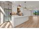 Open concept kitchen with an island and stainless steel appliances at 675 E 16Th St, Indianapolis, IN 46202