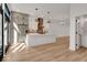 Open concept kitchen with a large island and stainless steel appliances at 675 E 16Th St, Indianapolis, IN 46202