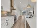Modern kitchen with white cabinets, stainless steel appliances, and an island at 675 E 16Th St, Indianapolis, IN 46202