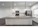 Modern kitchen with stainless steel appliances and large kitchen island at 810 7Th St, Columbus, IN 47201