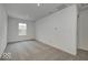 Spacious bedroom with gray carpet and large window at 5715 Cr W 750 N, McCordsville, IN 46055