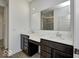 Bathroom with double vanity, quartz countertops, and a large mirror at 5715 Cr W 750 N, McCordsville, IN 46055