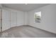 Spacious bedroom with gray carpet and window at 5715 Cr W 750 N, McCordsville, IN 46055
