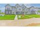 Two-story townhome with gray siding and landscaping at 5715 Cr W 750 N, McCordsville, IN 46055