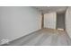 Bright bedroom with gray carpet and double doors at 5715 Cr W 750 N, McCordsville, IN 46055