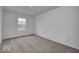 Simple bedroom with gray carpet and a window at 5715 Cr W 750 N, McCordsville, IN 46055