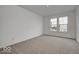 Spacious bedroom with neutral carpeting and large windows at 5715 Cr W 750 N, McCordsville, IN 46055