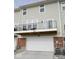 Townhouse exterior with balcony and garage at 6343 Central Blvd, Whitestown, IN 46075