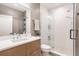 Modern bathroom with a walk-in shower and updated vanity at 501 S East St, Indianapolis, IN 46225