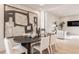 Modern dining room with large artwork at 501 S East St, Indianapolis, IN 46225