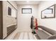 Convenient mudroom with bench and coat rack at 501 S East St, Indianapolis, IN 46225