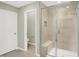 Bathroom with a walk-in shower and separate toilet area at 4123 Palermo Garden Dr, Indianapolis, IN 46239