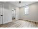Spacious basement bedroom with wood-look floors and an ensuite bathroom at 505 S East St, Indianapolis, IN 46203