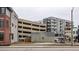Vacant lot with small house and parking garage at 505 S East St, Indianapolis, IN 46203