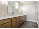 Modern bathroom with double vanity and large shower at 505 S East St, Indianapolis, IN 46203
