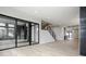 Open living space with hardwood floors, fireplace and sliding doors to balcony at 505 S East St, Indianapolis, IN 46203