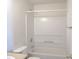 Clean bathroom with tub shower combination and toilet at 5824 Skyward Ln, Indianapolis, IN 46234