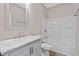 Small bathroom with white vanity and tub shower at 1126 W 35Th St, Indianapolis, IN 46208