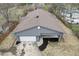 Aerial view of a freshly renovated ranch house with new roof and landscaping at 6233 Lafayette Rd, Indianapolis, IN 46278