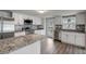 Modern kitchen with stainless steel appliances and granite countertops at 6233 Lafayette Rd, Indianapolis, IN 46278