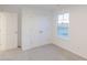 Well-lit bedroom with double door closet and window at 9310 Anthem Ave, Plainfield, IN 46168