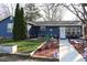Blue Ranch home with landscaping and walkway at 306 S Cherry St, Westfield, IN 46074