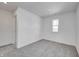 Simple bedroom with carpet flooring and a window at 2008 Oak Leaf Way, Shelbyville, IN 46176