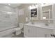 Double vanity bathroom with a soaking tub and shower at 406 S Dearborn St, Indianapolis, IN 46201