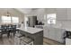 Eat-in kitchen with stainless steel appliances and white cabinets at 406 S Dearborn St, Indianapolis, IN 46201