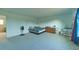Bright bedroom with carpeted floors and a large window at 1184 Lakeshore Drive, Greenwood, IN 46143