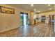 Modern kitchen with stainless steel appliances and wood-look floors at 1184 Lakeshore Drive, Greenwood, IN 46143