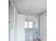 View of an entryway with white doors and arched openings leading to other rooms at 819 E 49Th St, Indianapolis, IN 46205