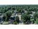 Aerial view showcasing the neighborhood and surrounding trees at 819 E 49Th St, Indianapolis, IN 46205